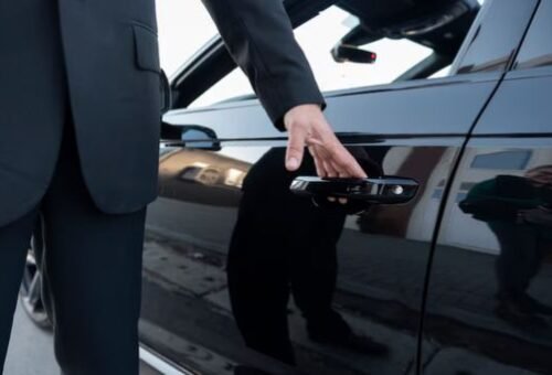 AA Limousine and Sedan vehicle parked at DCA pickup zone