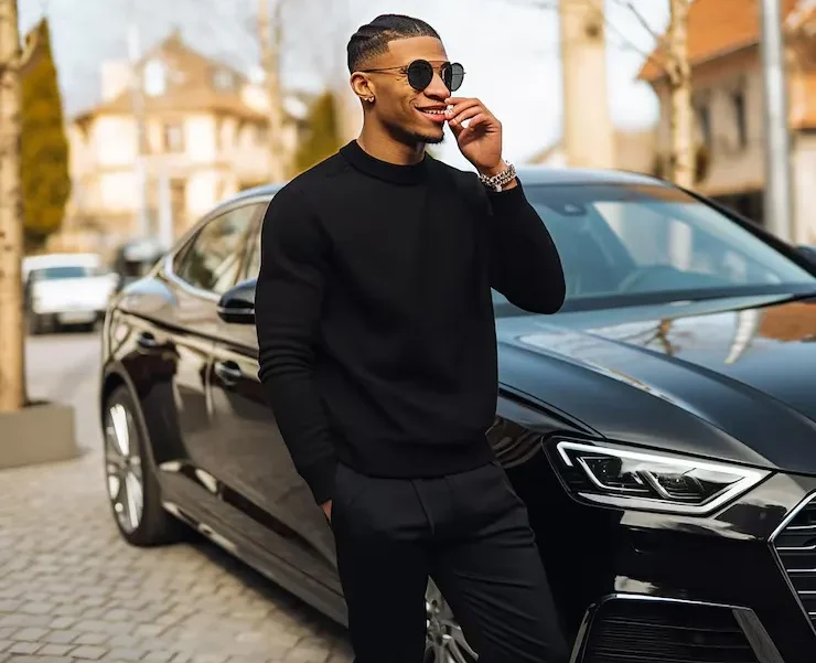 Professional chauffeur opening limo door for passenger in Columbia MD