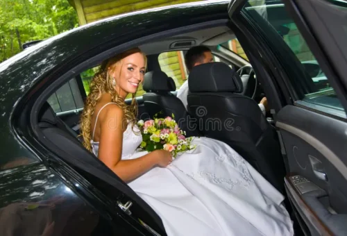 Executive stepping out of luxury car service in Greenbelt MD